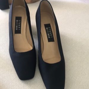 Stuart Weitzman black pump with patent leather heal.  NEVER WORN. Size 7.5